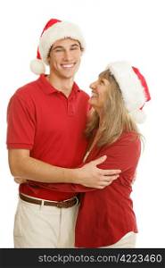 College aged young man and his mom laughing together on Christmas. Isolated on white.