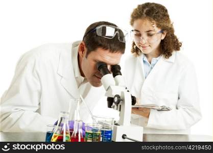 College intern writing down notes as she assists a scientist in his laboratory. Isolated on white.