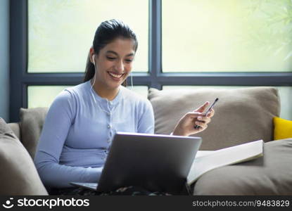 COLLEGE STUDENT ACTIVELY PARTICIPATING IN ONLINE CLASS 