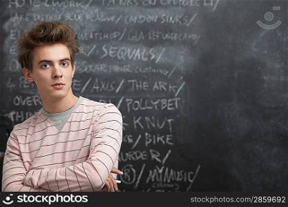 College Student in Front of Blackboard