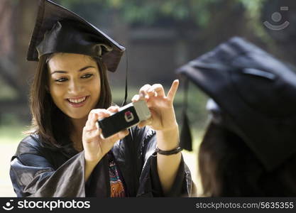 College student taking a photograph