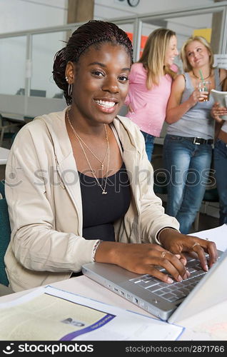 College Student Working on Laptop