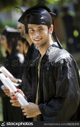 College students at graduation ceremony
