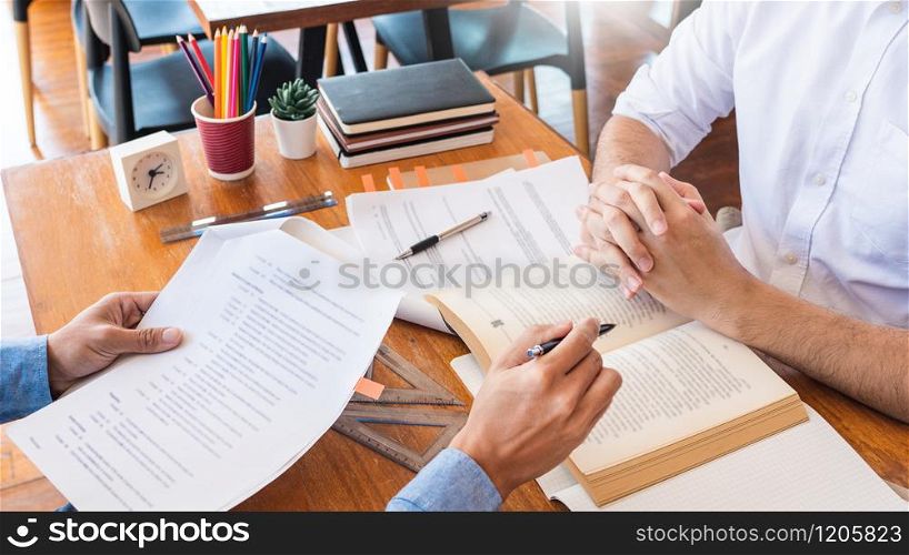 College tutor helps friend teaching and learning for a test or an exam catching up, education and school encouragement concept.