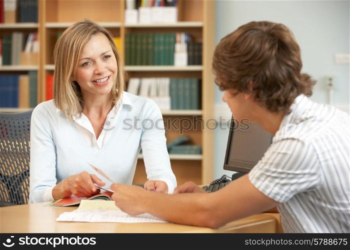 College tutor with student