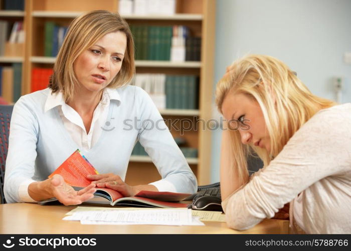 College tutor with student