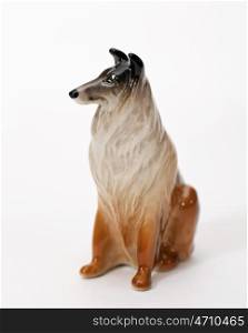 Collie. Ceramic figurine, dog breed isolated on white