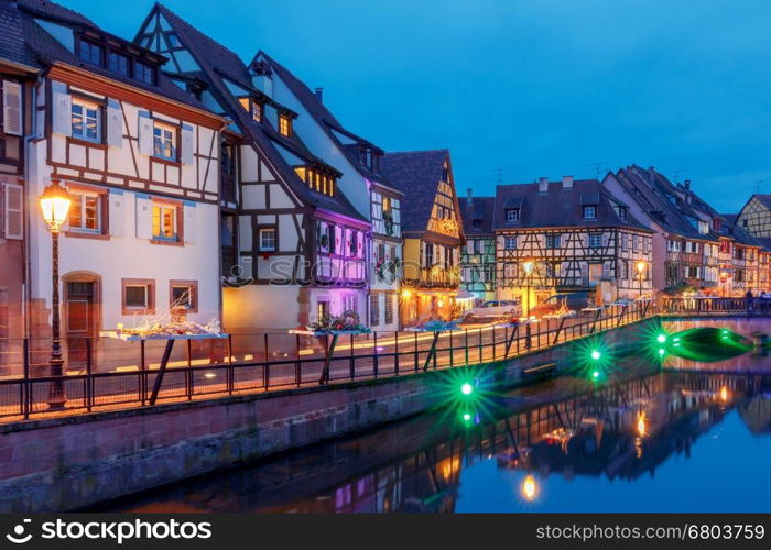 Colmar. City Canal on the sunset... The old half-timbered houses on the canal in the blue hour. Colmar. France. Alsace.