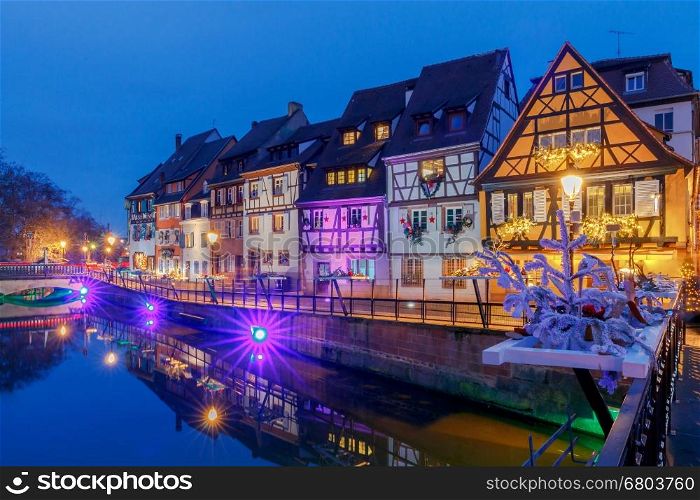 Colmar. City Canal on the sunset... The old half-timbered houses on the canal in the blue hour. Colmar. France. Alsace.