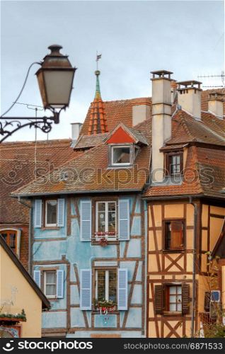Colmar. Old half-timbered houses.. Medieval multicolored half-timbered houses on canals on Christmas Day. Colmar. France. Alsace.