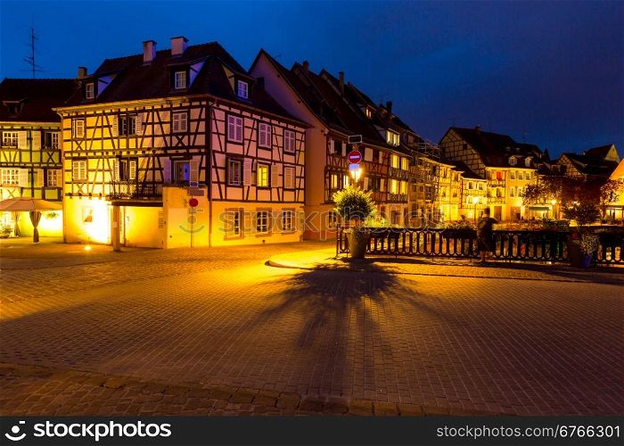 Colmar, Petit Venice, at dusk traditional colorful houses. Alsace, France.