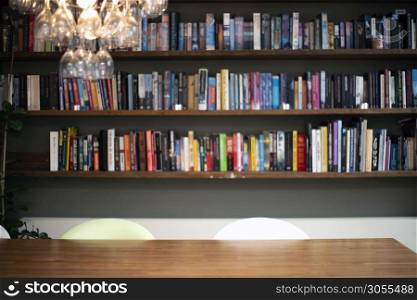 Coloful wall with many books on book shelves in a modern living room blurred, retro interior beauty. Coloful wall with many books on book shelves in a modern living room blurred, retro interior