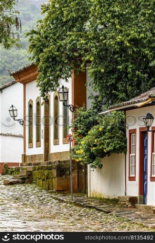 Colonial houses with colorful facades and cobblestone slopes in the historic city of Tiradentes, one of the most famous in the state of Minas Gerais. Colonial houses with colorful facades and cobblestone slopes in the historic city of Tiradentes