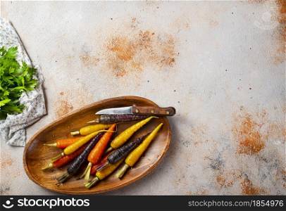 color carrot on wooden plate, color carrot