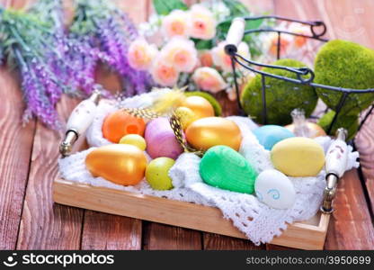 color easter eggs on a table, easter background