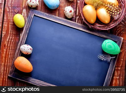 color easter eggs on a table, easter background