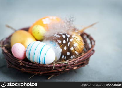 color easter eggs on the table, easter background