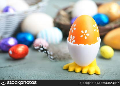 color easter eggs on the table, easter background