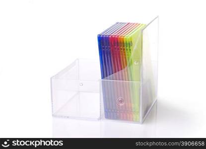 Color floppy disks in box isolated on white