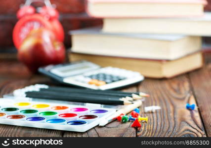 color paint and brushes on a table