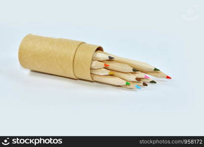 Color pencil in box on white background