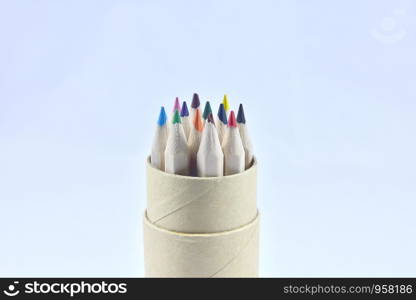 Color pencil in wooden box on white background