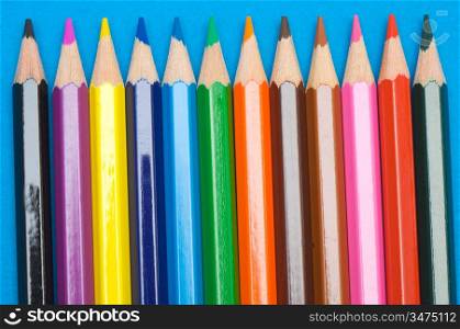 Color pencils - a over blue background -