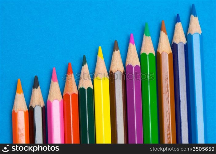 Color pencils - a over blue background -