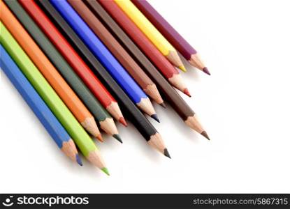 color pencils aligned and isolated on white