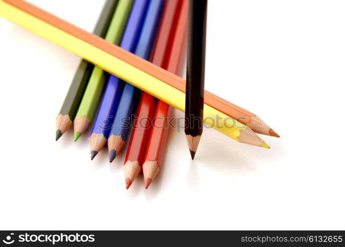 color pencils aligned and isolated on white