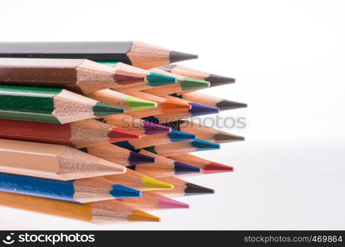 Color pencils of various color on a white background