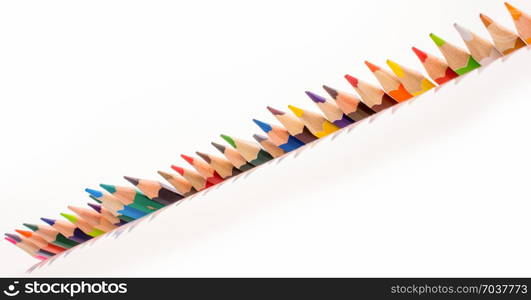 Color Pencils of various colors on a white background