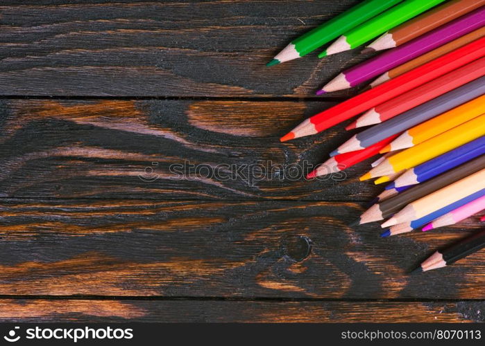 color pencils on a table, school supplies