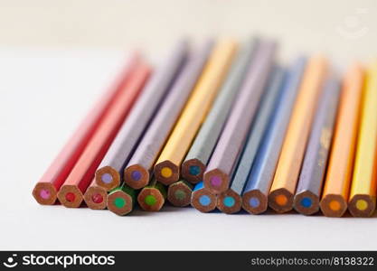 Color pencils on white background, copy space. . Color pencils on white background.