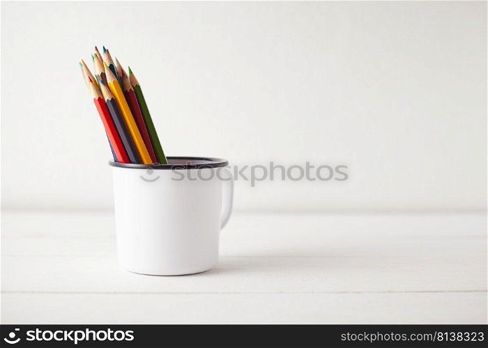 Color pencils on white background, copy space. . Color pencils on white background.