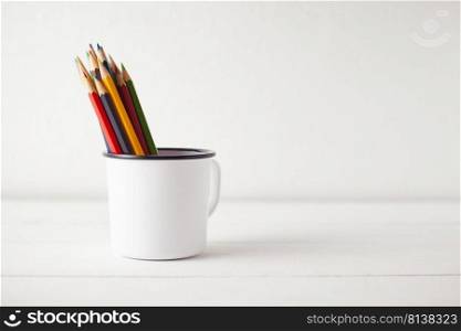 Color pencils on white background, copy space. . Color pencils on white background.