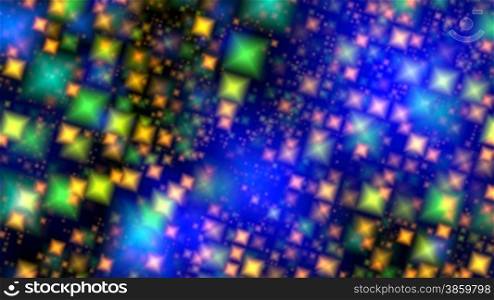 Color pyramids symmetrized sparkle and slowly rotate against a dark background.