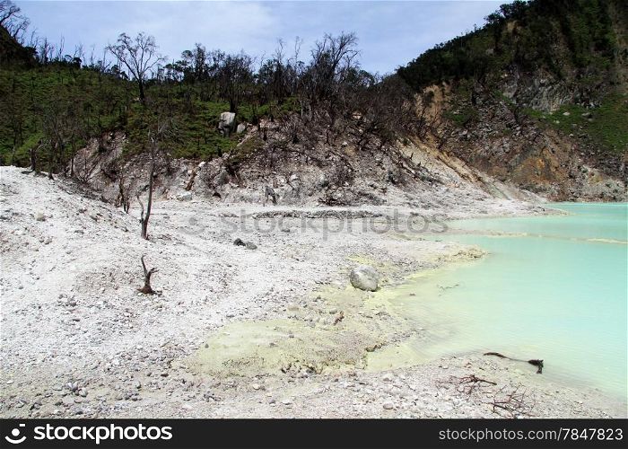 Color water in the crater lake Kawah Putih near Bandung, Indonesia