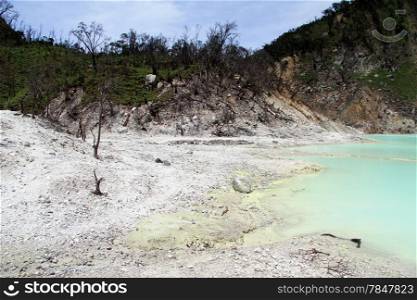 Color water in the crater lake Kawah Putih near Bandung, Indonesia