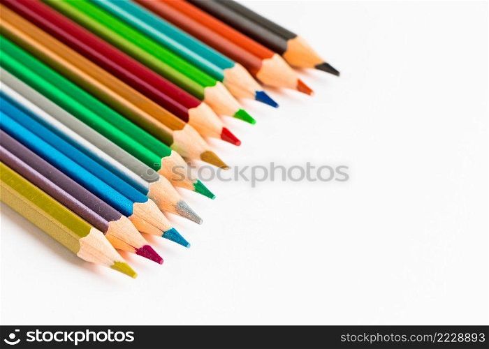 Color wooden pencils isolated on white background. Multi-colored palette for drawing. Place for text.. Color wooden pencils isolated on white background. Multi-colored palette for drawing, place for text.