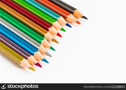 Color wooden pencils isolated on white background. Multi-colored palette for drawing. Place for text.. Color wooden pencils isolated on white background. Multi-colored palette for drawing, place for text.
