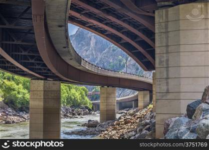 Colorado River and highway bridges in Glenwood Canyon, Colorado