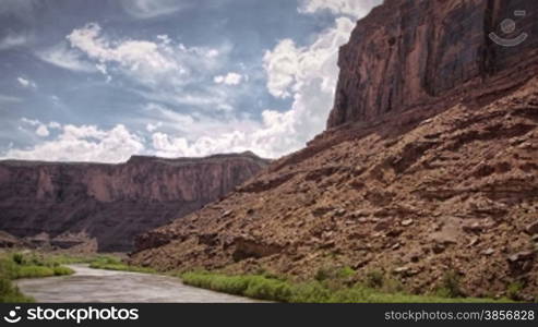 Colorado River Rafting Sunset Timelapse near Moab Utah Canyonlands Wilderness. HDR video. Themes of nature, extreme sports, wilderness, water sports, travel, adventure, time.