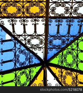 colorated glass and sun in morocco africa window and light