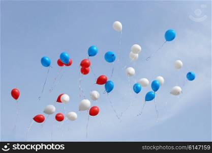 colored balloons on sky