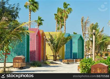 Colored beach bathing cabins in Dubai. Colored beach bathing cabins in Dubai, United Arab Emirates