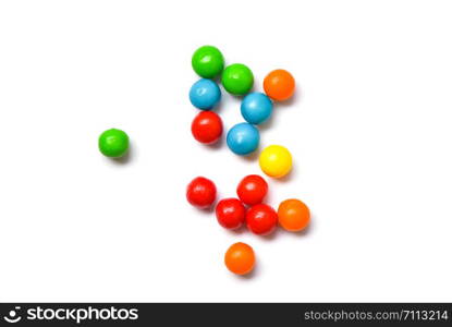 Colored candies / Colorful of small chocolates candy on white background , top view