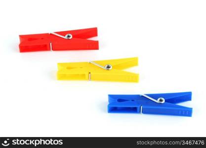colored clothespins isolated on white background