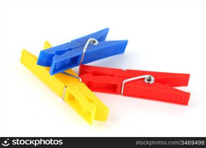 colored clothespins isolated on white background