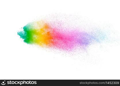 Colored cloud. Colorful dust explode. Indian festival Holi. Colorful powder explosion on white background.